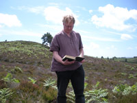 Professor Richard Kerridge reads from a Hardy text on the heath.
