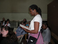 Student Cherie Hamilton, who is studying writing for children and YA, reads from her journal.